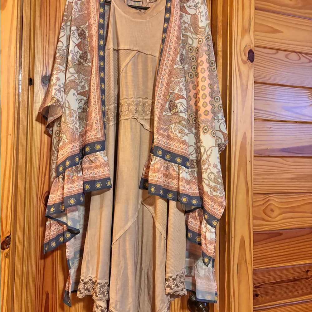 Tan sleeveless dress with designed cardigan to match.  Never been worn